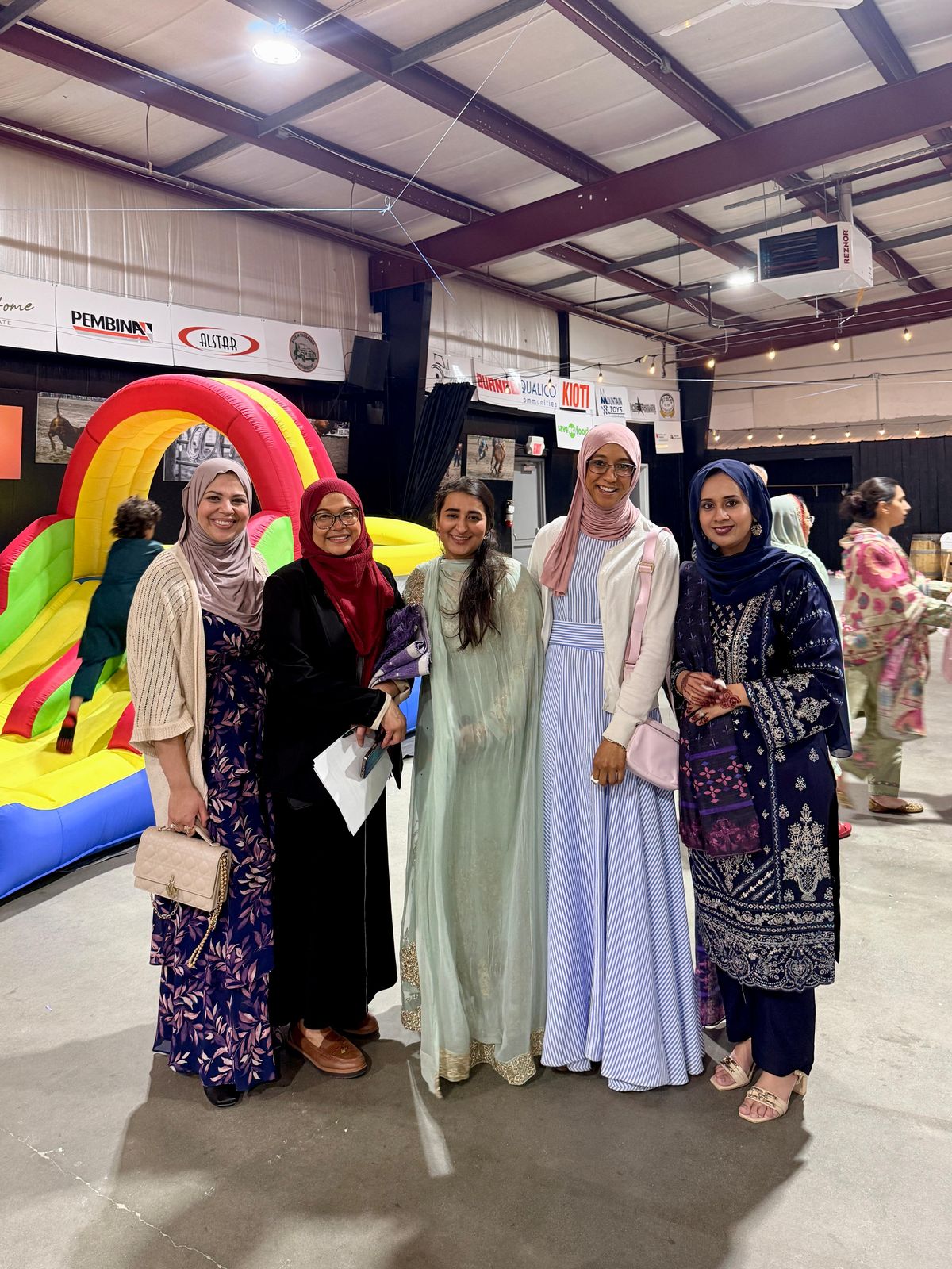 Women and families gathering at a Muslims of Cochrane community event